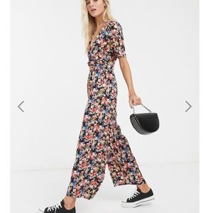 ASOS DESIGN twist front jumpsuit in floral print